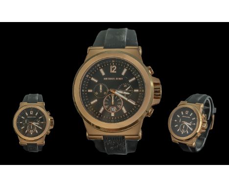 Michael Kors Gentleman's Wristwatch, black strap and face, white enamel baton numerals, subsidiary dial and date aperture.  
