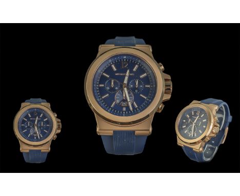 Michael Kors Gentleman's Wristwatch, navy blue strap and face, white enamel baton numerals, subsidiary dial and date aperture