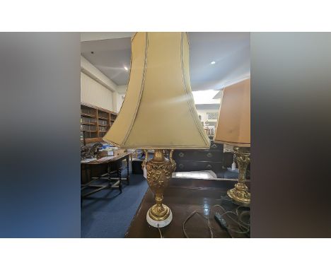 20th Century Bronzed Finish Table Lamp, in the form of an urn, with raised cherub decoration.