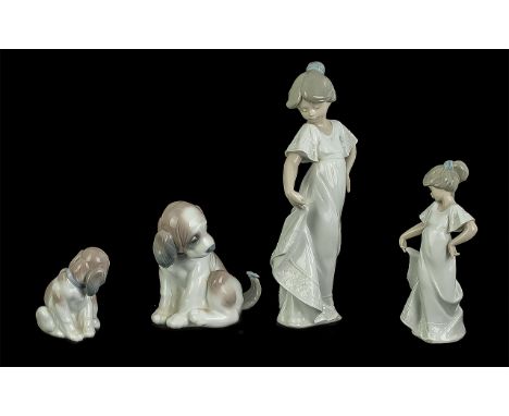 Lladro Figure, No. 06210 'Gentle Surprise' boxed, depicts a puppy, and Nao figure of a young lady, 9'' high.