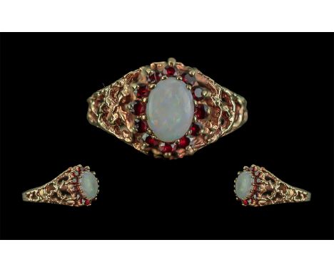 Ladies 9ct Gold Opal and Garnet Set Cluster Ring, Flower head Setting. Full Hallmark to Interior of Shank. Opal of Pleasing C