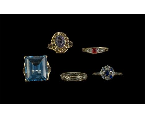 Collection of 9ct Gold Rings, including ring set with large square blue stone, set with red stone and crystal, amethyst, blue