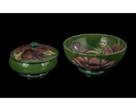 Moorcroft 6'' Bowl, dark green with Hibiscus pattern, and a dark green lidded trinket box 5'' diameter.