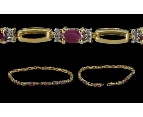 Ladies - Attractive Diamond and Ruby Set Bracelet. Marked 9.375. Well Matched Rubies. Weight 6.6 grams. Length 7.5 Inches - 1