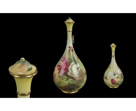 Royal Worcester Hadley Vase, painted with roses, gilt finial, present but not attached.  Measures 9'' high. Condition Report 