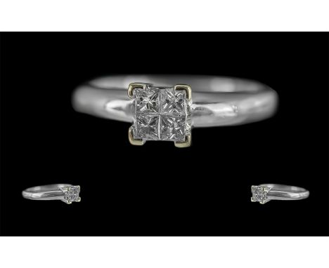 18ct White Gold Diamond Set Cluster Ring of Square Form. Marked 18ct to Interior of Shank. The Four Princes Cut Diamond of Ex