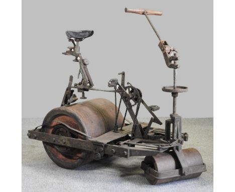 A highly unusual early 20th century iron pedal powered cricket crease roller, invented and made by ASF Robinson, of Beccles, 