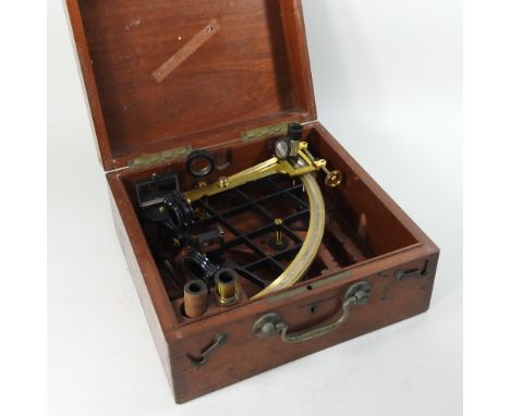 An early 20th century German brass sextant, by R.JMME, Berlin, numbered 2578, in a fitted wooden box, bearing a label R. JMME