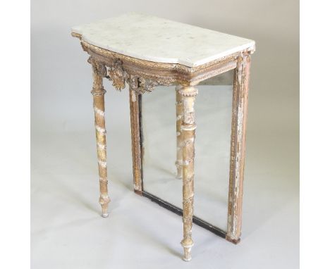 An early 19th century French carved wood and gilt gesso console table, of bow front shape, with a white marble top and mirror