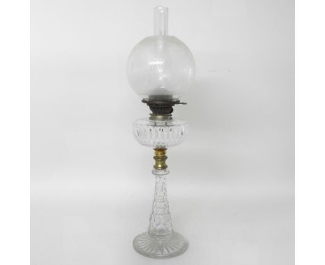 A Victorian brass mounted cut glass oil lamp, with a brass reservoir, inscribed Hinks' Duplex No.2, on a tapered column and s