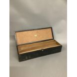 A sturdy, large, dark green leather covered fan box, of a size normally containing a feather fan,