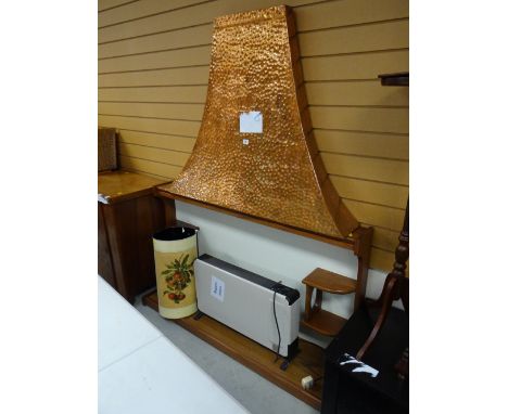 A vintage wooden fire surround, copper hood, electric fan heater etc