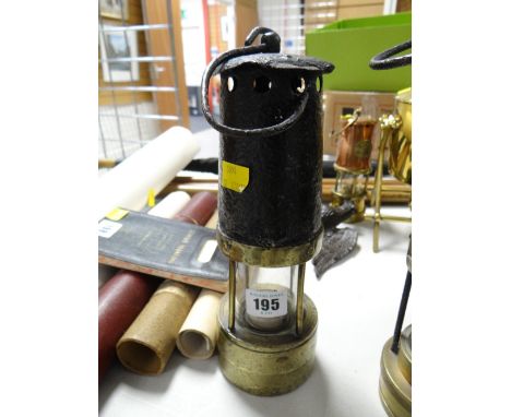 An early antique miners lamp imprinted no. 588