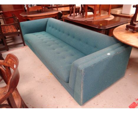 A large retro buttoned fabric sofa circa 1960s / 70s