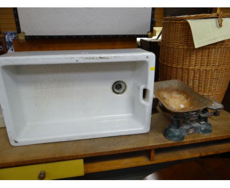 A vintage ceramic Belfast sink and an old set of Carnegie & Layton scales