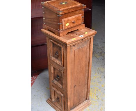 A lightwood planter stand with drawers and a hardwood box