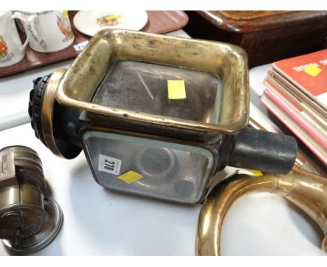 An antique coach lamp