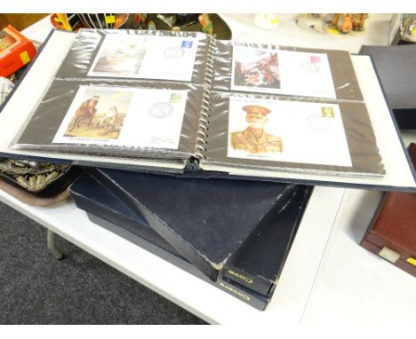 Four boxed folders of first day covers