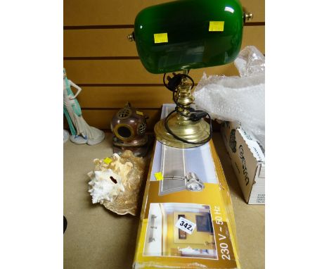 A boxed 3-spot ceiling light, a brass and green shade desk lamp, a small brass diving helmet etc