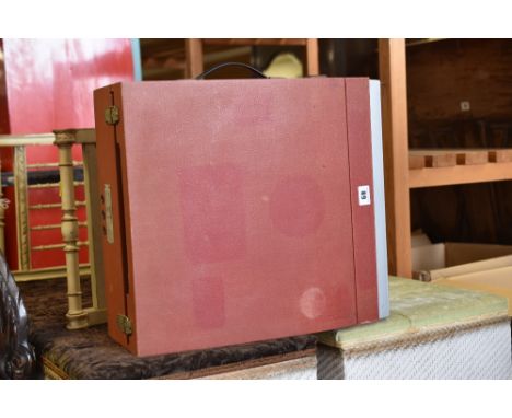 A Bush record player-type RP60 in red outer case
