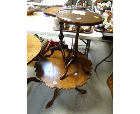 A reproduction mahogany circular pie crust side table together with two reproduction mahogany wine tables