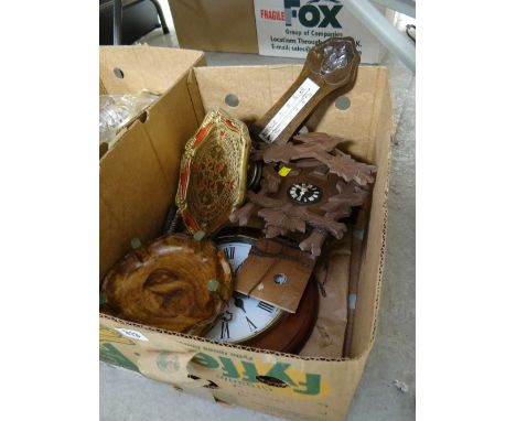 A box of mixed items including cuckoo clock barometer etc