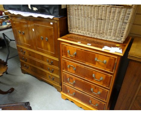 A reproduction yew wood hi-fi cabinet together with a reproduction television cabinet