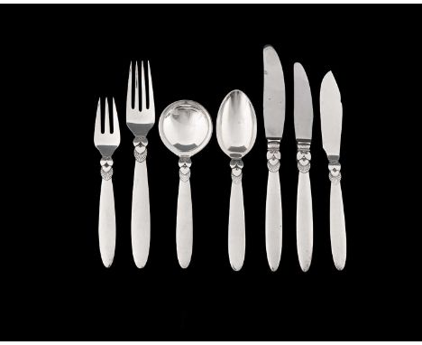 Gundorph Albertus for Georg Jensen, a suite of Cactus pattern eight-piece silver/steel place settings for six, designed circa