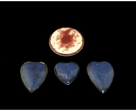 Ruskin Pottery, four plaques, including a sang de boeuf flambe High Fired roundel, a pair of Souffle glazed hearts in blue an