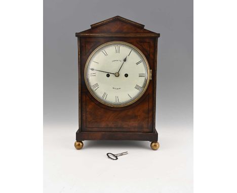 J. Butler, Reading, a Regency mahogany and brass strung bracket clock, circa 1820, pediment case, brass fretwork sound grille