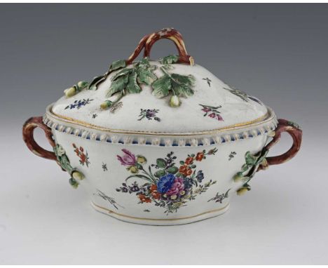 A Worcester polychrome soup tureen and cover, circa 1770, quatrelobed form, painted with floral bouquets and sprigs in the st