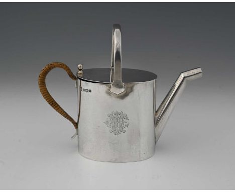 After Christopher Dresser, an Aesthetic style novelty silver hot water jug, Williams Ltd., Birmingham 1908, in the form of a 