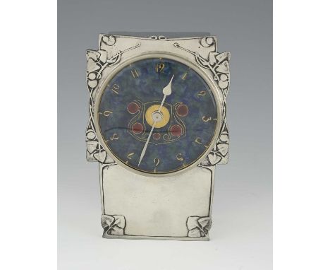 Archibald Knox for Liberty and Co., an Arts and Crafts Tudric pewter and enamelled clock, model 0609, bracketed cuboid form, 
