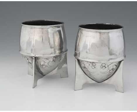 Archibald Knox for Liberty and Co, a pair of Tudric Arts and Crafts pewter vases, model 0225, amphora or bullet form with thr