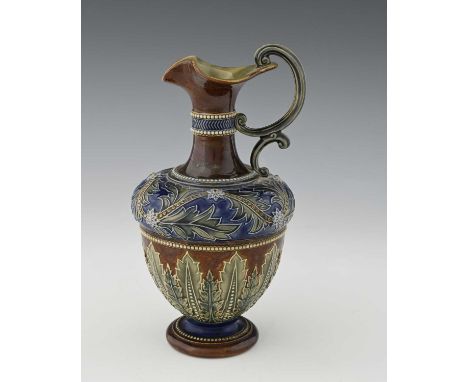 A Doulton Lambeth relief moulded ewer or jug for the Art Union of London, circa 1900, 24cm high approx