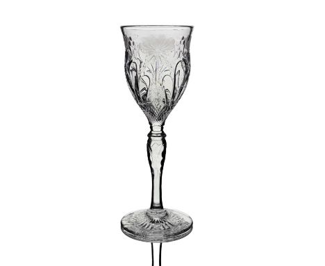Frederick Carder for Stevens and Williams, an intaglio cut rock crystal engraved hock wine glass, circa 1900, the ogee tulip 