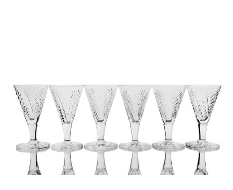 Herbert Webb for Webb Corbett, a set of six Art Deco cut glass wine glasses, circa 1930s, conical form, cut with stylised fol