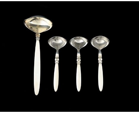 Gundorph Albertus for Georg Jensen, a Cactus pattern silver soup ladle, designed circa 1930, and three stainless steel bowled