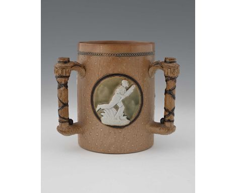A Doulton Lambeth stoneware cricket tyg, 1882, the three circular cartouches moulded in relief with figures of cricketers, re