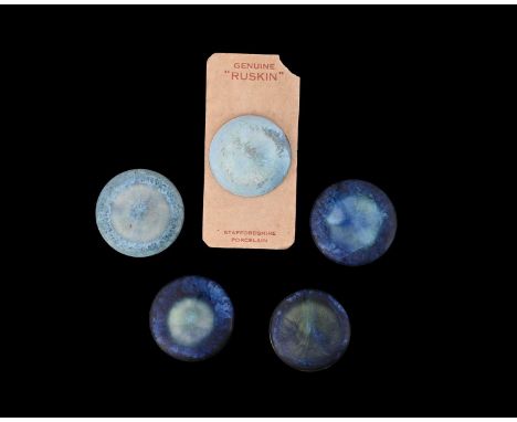 Ruskin Pottery, four Souffle glazed roundels and a large button, curdled turquoise and blue glazes, one on original sales car