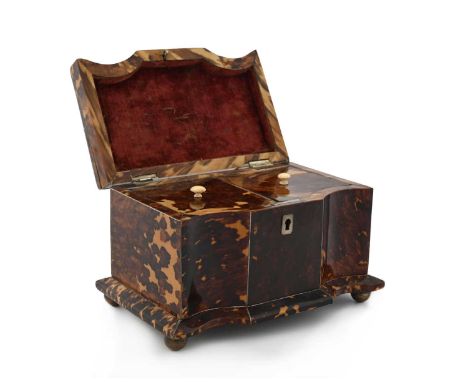 A Regency tortoiseshell tea caddy, circa 1820, sarcophagus form, serpentine fronted with domed lid, inlaid with silver string