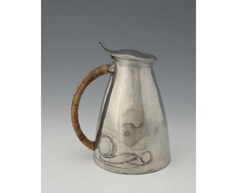 Archibald Knox for Liberty and Co, an Arts and Crafts Tudric pewter lidded pitcher, model 0307, tapered form, cast in relief 