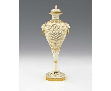 George Owen for Royal Worcester, reticulated pedestal vase and cover, 1912, slender inverse baluster form with lions mask and