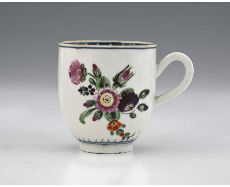 A Worcester polychrome and underglaze blue coffee cup, crescent mark, circa 1775, painted with a floral bouquet and sprigs, i