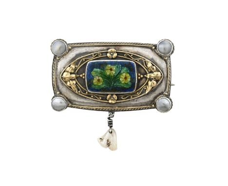 Edward Spencer for the Artificers Guild, an Arts and Crafts silver, gold and enamel brooch, the central plaque in the style o