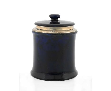 A Royal Doulton flambe tobacco jar and cover, silver mounted and marked for London 1917, cylindrical form, blue marbled, 14cm