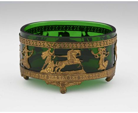 A French Palais Royal gilt metal and green glass dish, in the Empire style, probably Baccarat, the straight sided oval bowl w