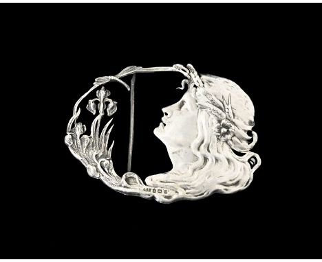 An Arts and Crafts cast silver buckle, Arthur John Smith, Birmingham 1904, in the form of a maidens head and irises, in the A