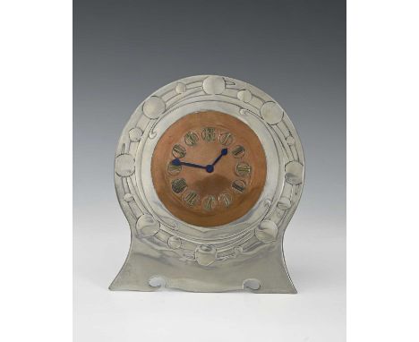 Archibald Knox for Liberty and Co, an Arts and Crafts Tudric pewter and copper clock, model 0366, circular bracket footed for