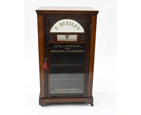 An Edwardian mahogany gun shop display cabinet, 'F.Beesley, by royal appointment guns, cartridges and shooting accessories, S